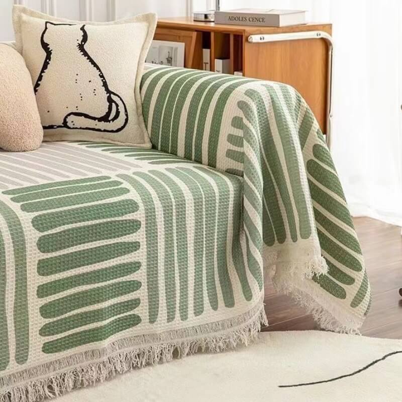 Cover di divano multicolore del modello geometrico - design moderno per una casa elegante