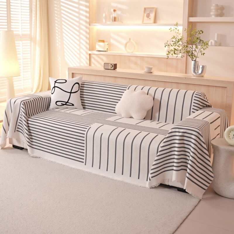 Cover di divano multicolore del modello geometrico - design moderno per una casa elegante