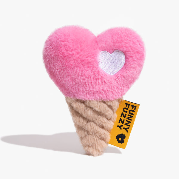 Waffle-cone quilting + pastel scoop—sweet squeak, zero melt.