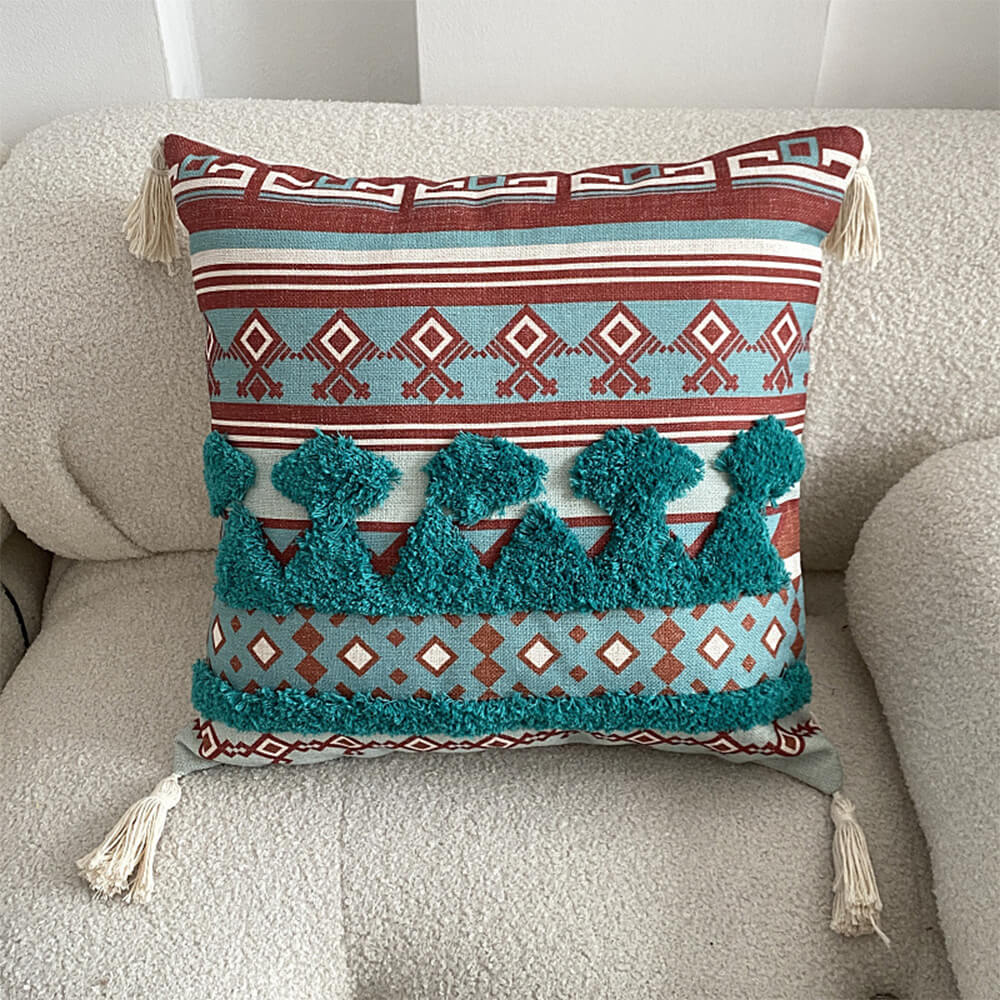 Coussin décoratif d'inspiration marocaine avec pompon